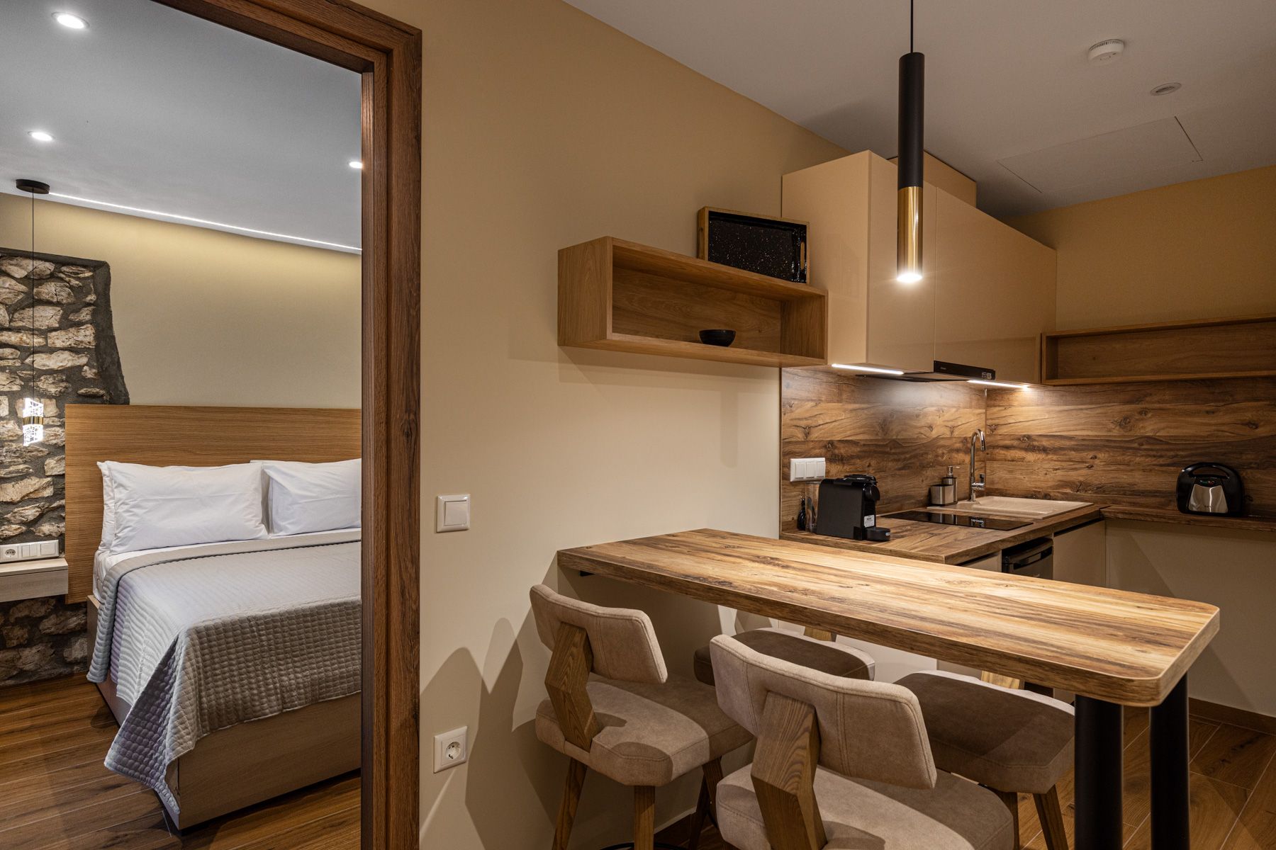 The dining area in Anemoessa, looking through to the bedroom