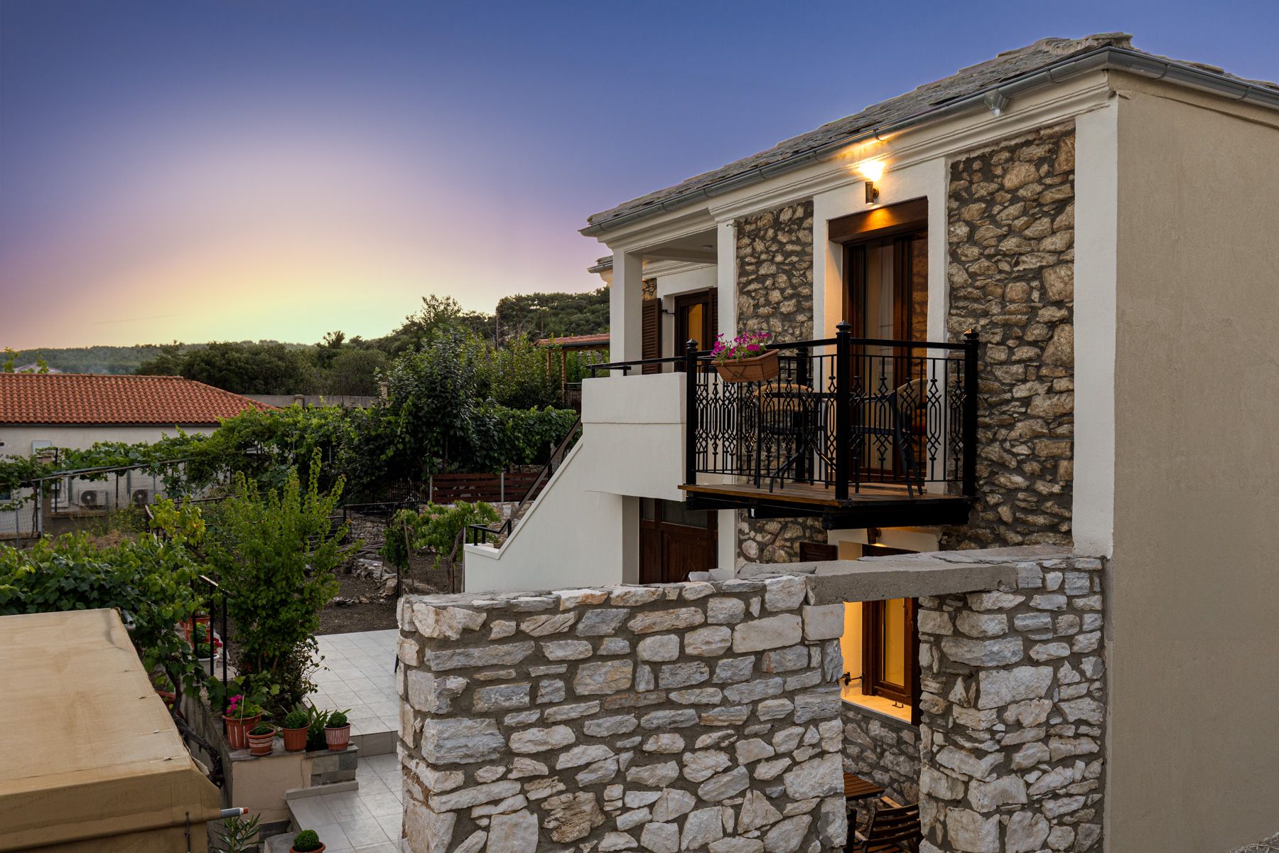 Looking out over the terrace and the village rooftops at dusk